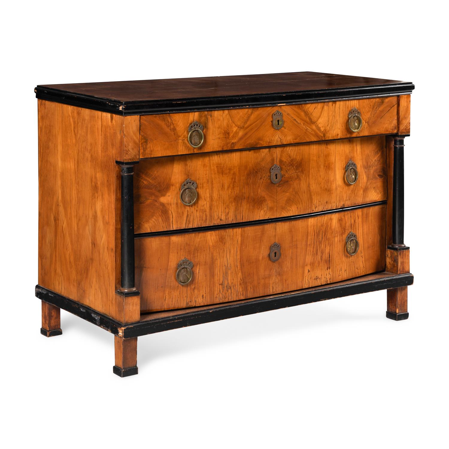 A Biedermeier Part-Ebonized Pearwood Commode