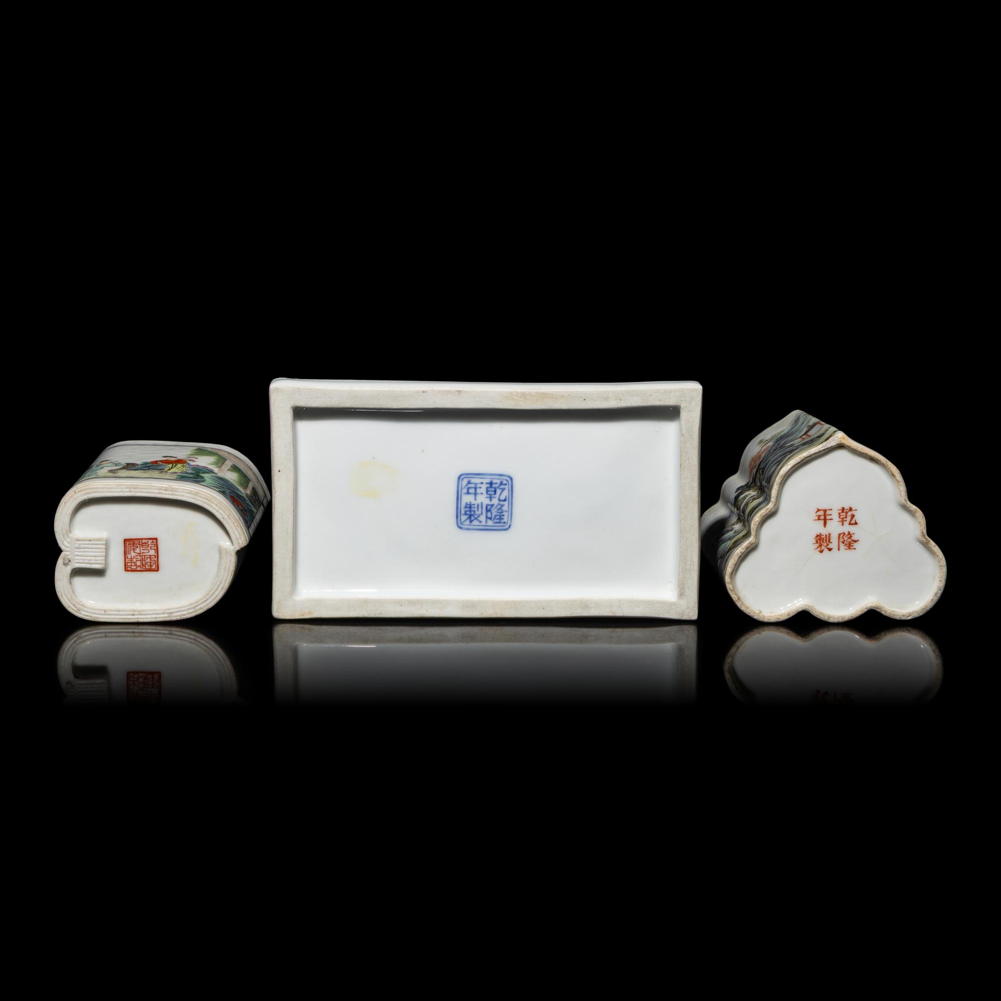 Three Chinese Famille Rose Porcelain Scholar's Objects, 20th Century — 近代 粉彩山水人物圖筆筒二及帶蓋硯台一