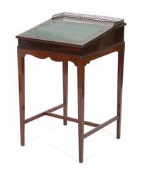 A George III Mahogany Desk Height 34 x width 20 1/2 x depth 22 inches. — 19TH CENTURY