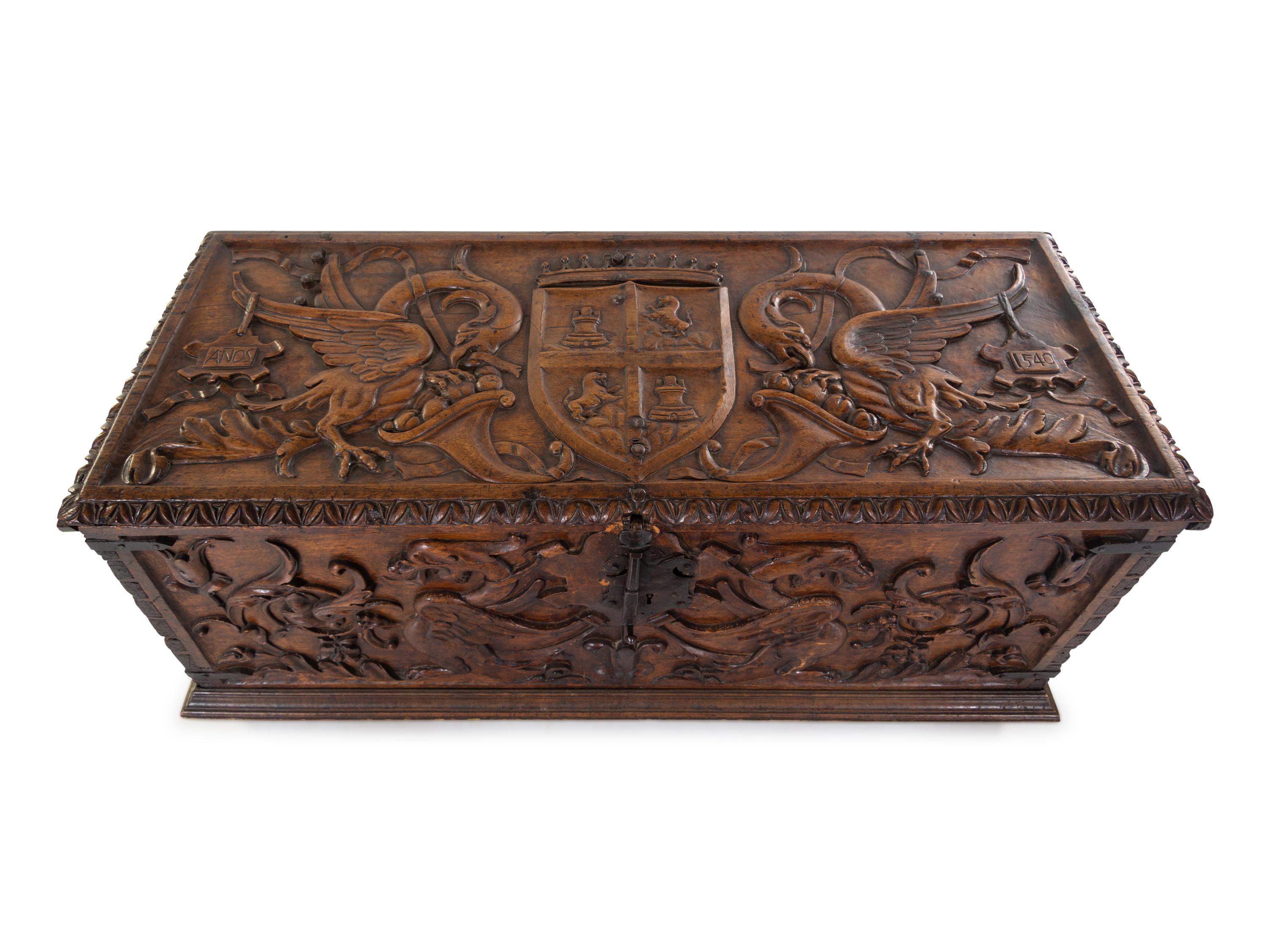 A Continental Carved Walnut Cassone