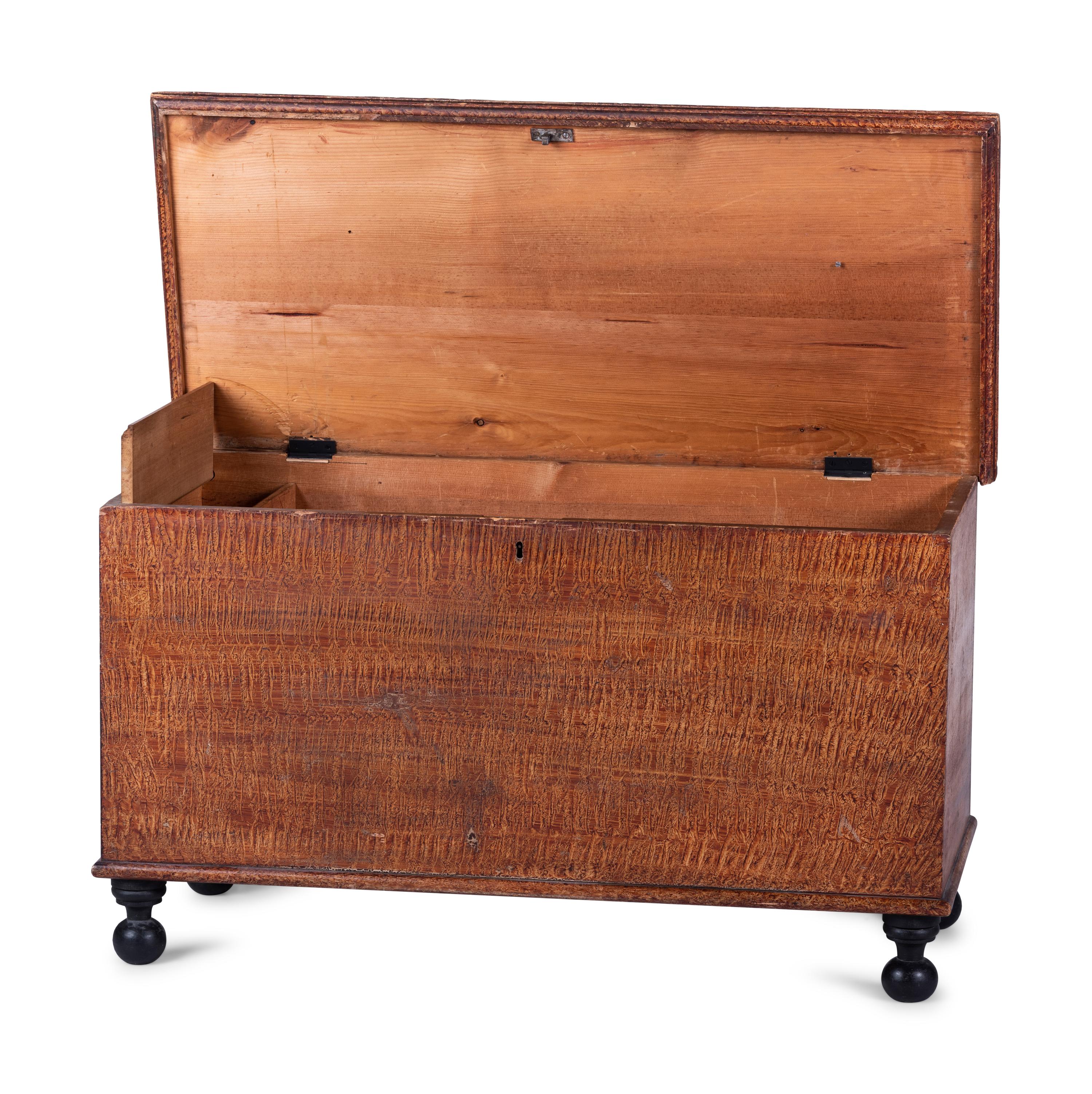 A Federal Grain-Painted Pine Blanket Chest on Bun Feet