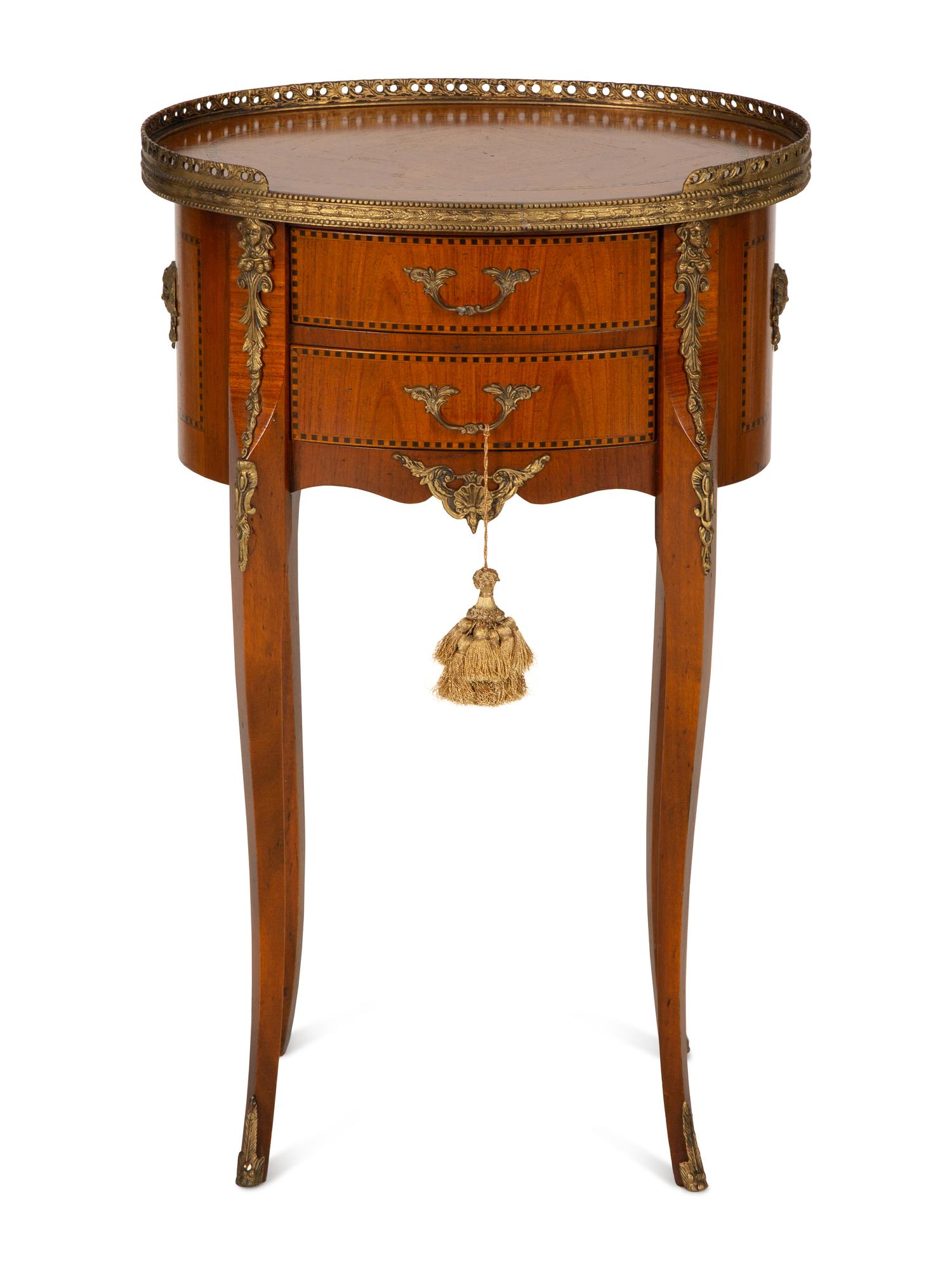 A Louis XV/XVI Transitional Style Gilt Metal Mounted Fruitwood Side Table