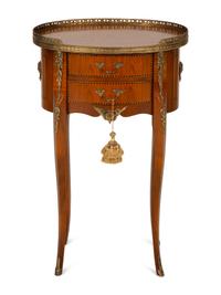 A Louis XV/XVI Transitional Style Gilt Metal Mounted Fruitwood Side Table