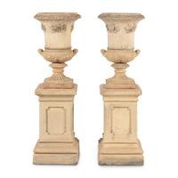 A Pair of Terra Cotta Garden Urns and Plinths
