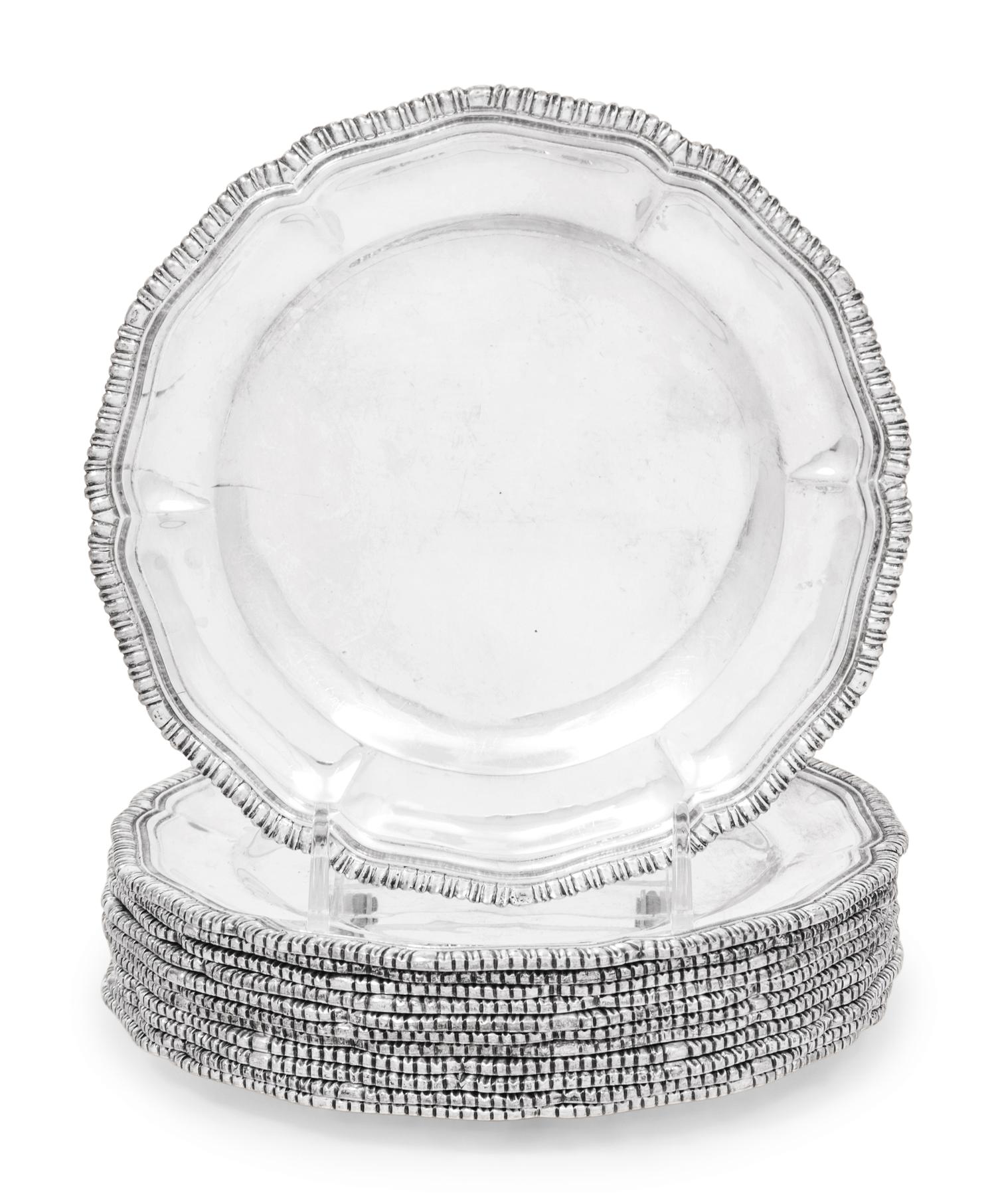 A Set of Twelve Mexican Silver Bread Plates