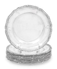 A Set of Twelve Mexican Silver Bread Plates