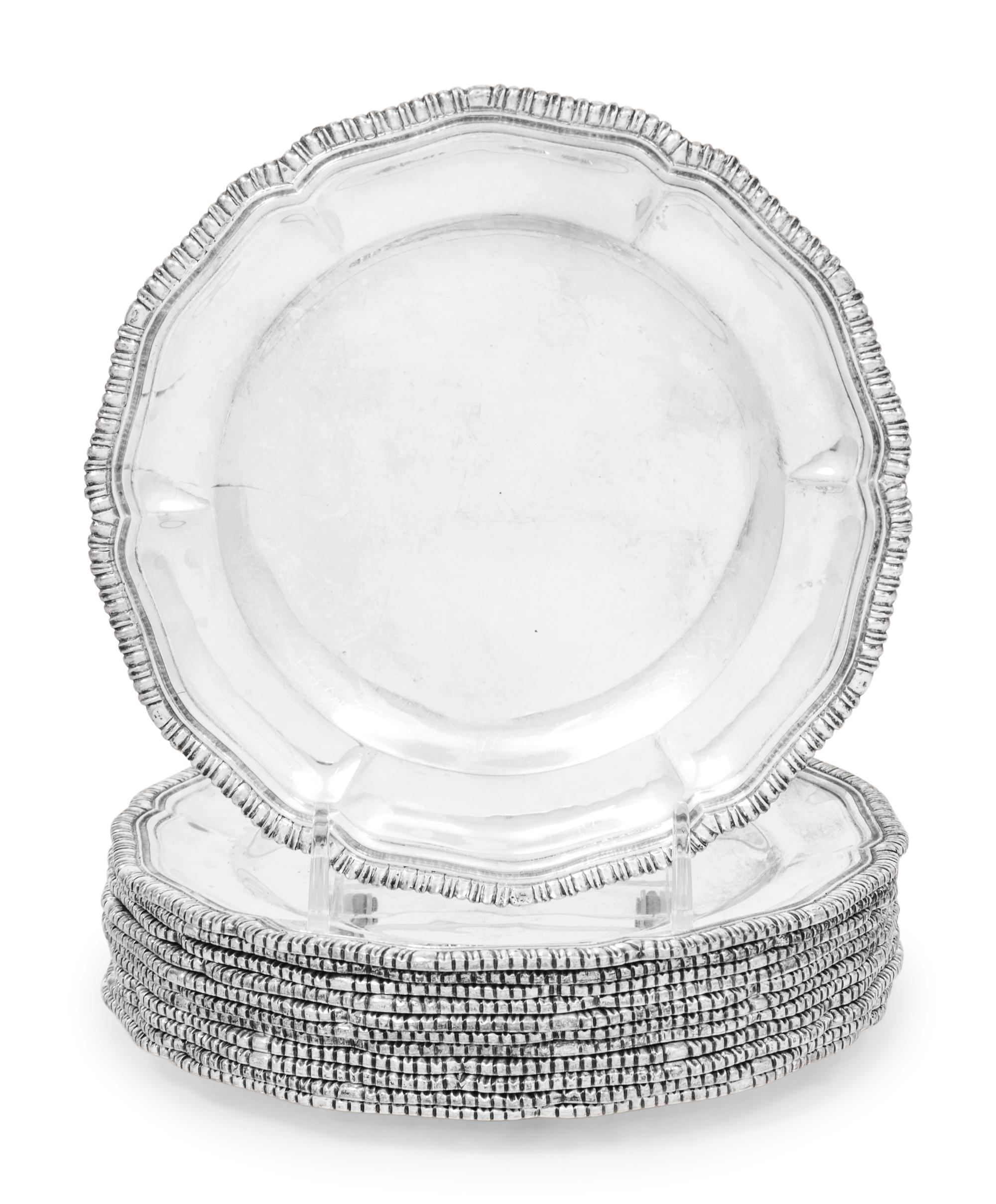 A Set of Twelve Mexican Silver Bread Plates