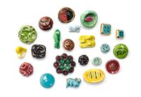 A Collection of Buttons Diameter of largest 1 1/2 inch.