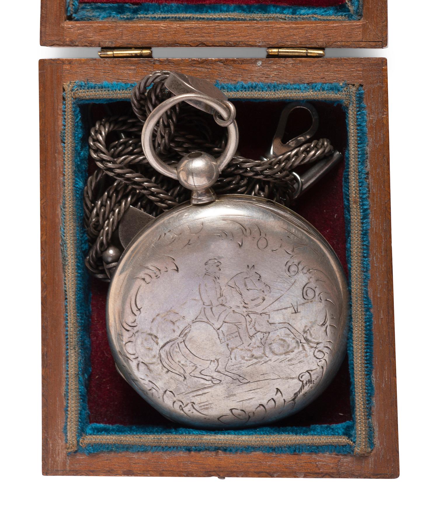 Silver patent lever pocket watch engraved with cavalry scenes.