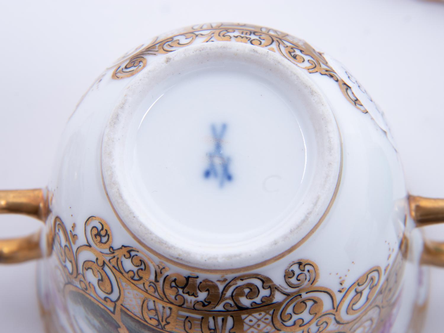 Three Meissen Painted and Parcel Gilt Porcelain Cup and Saucer Sets, a Covered Cup and Two Spoons