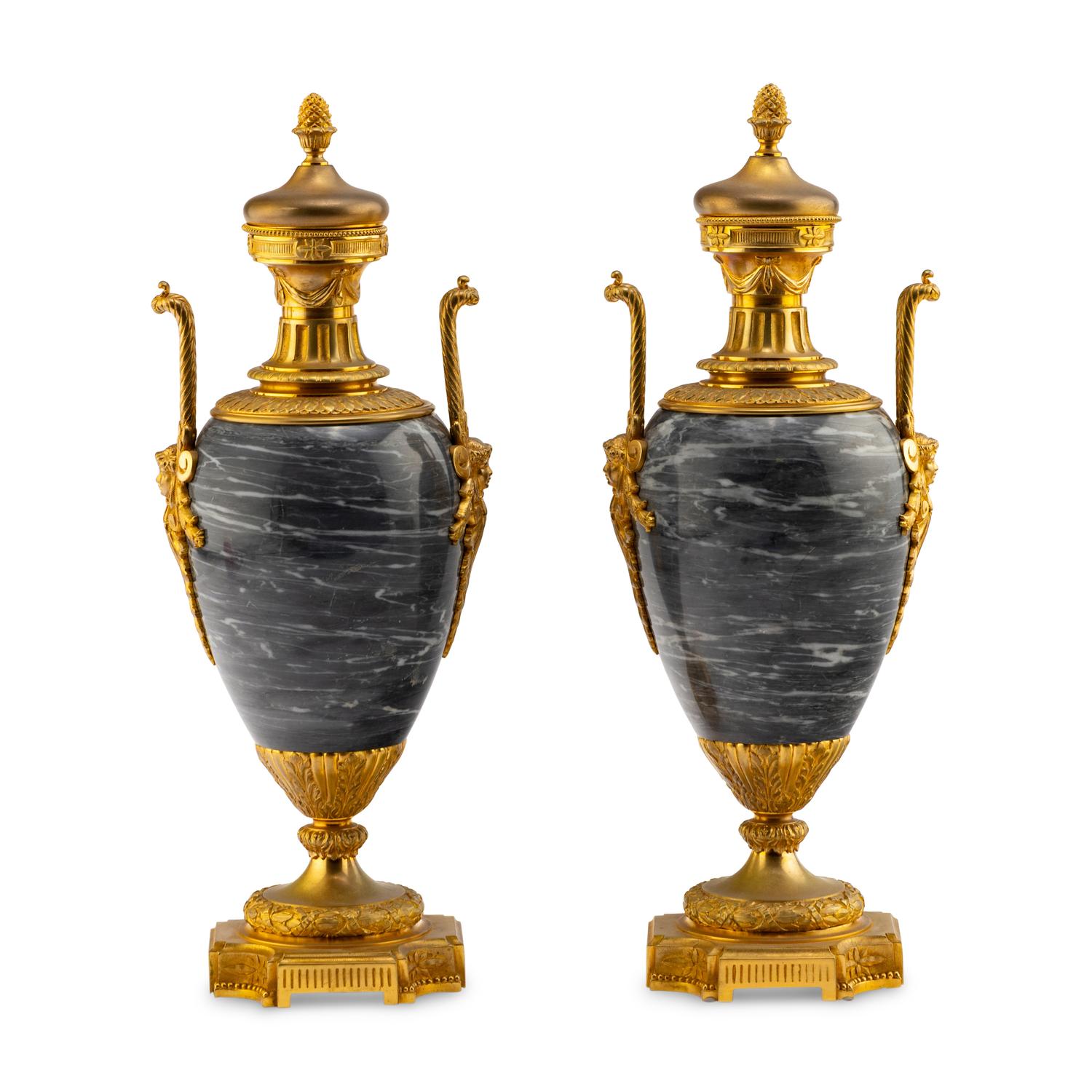 A Pair of Louis XVI Style Gilt Bronze Mounted Marble Urns