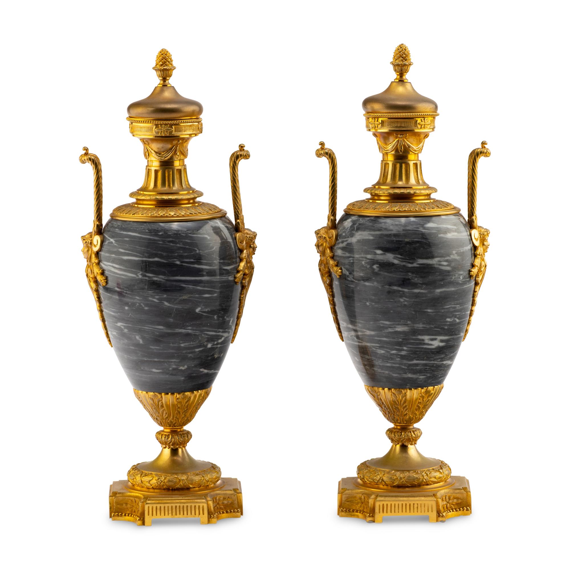 A Pair of Louis XVI Style Gilt Bronze Mounted Marble Urns