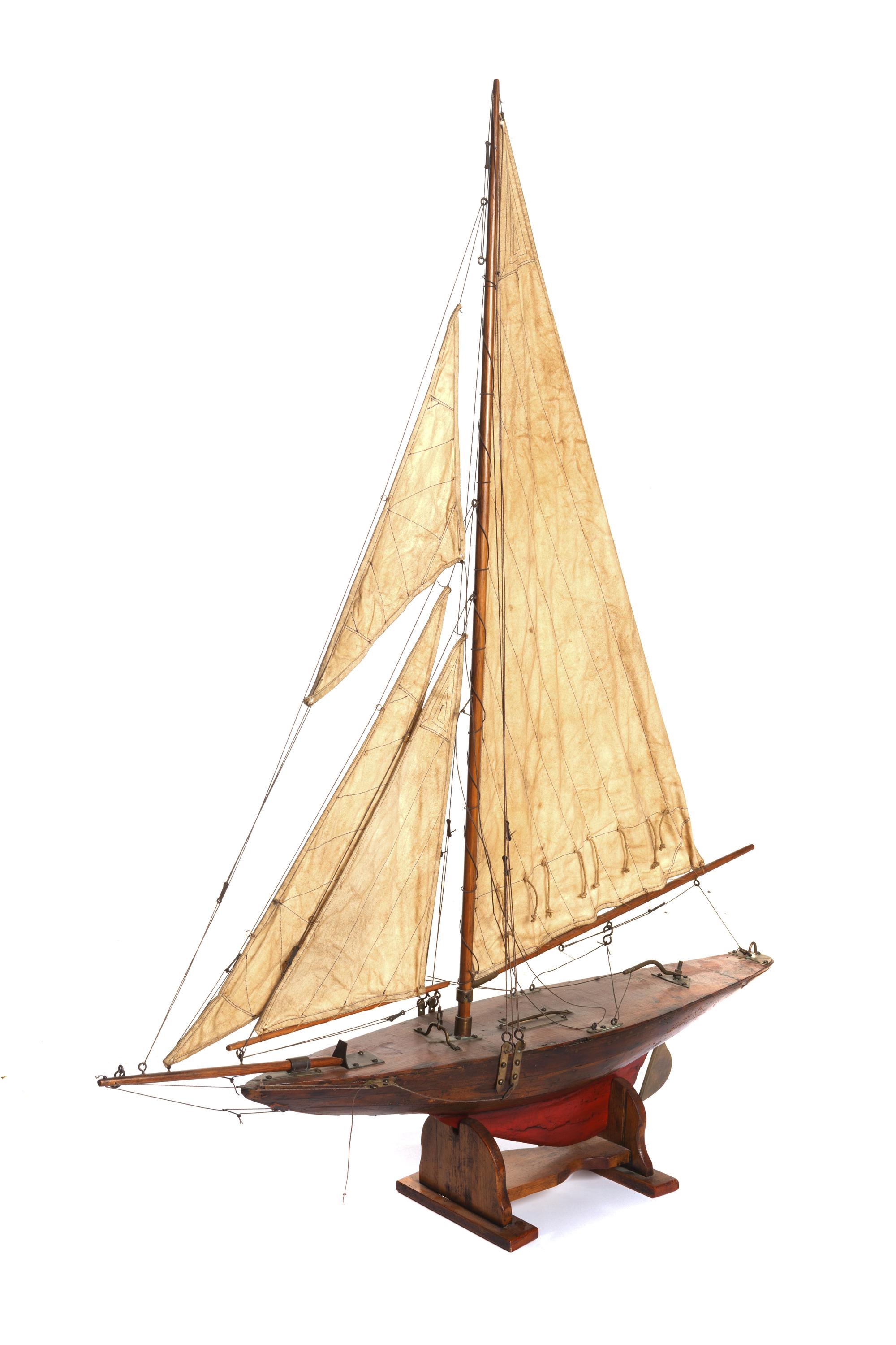 A Brass Mounted Painted Wood Pond Boat