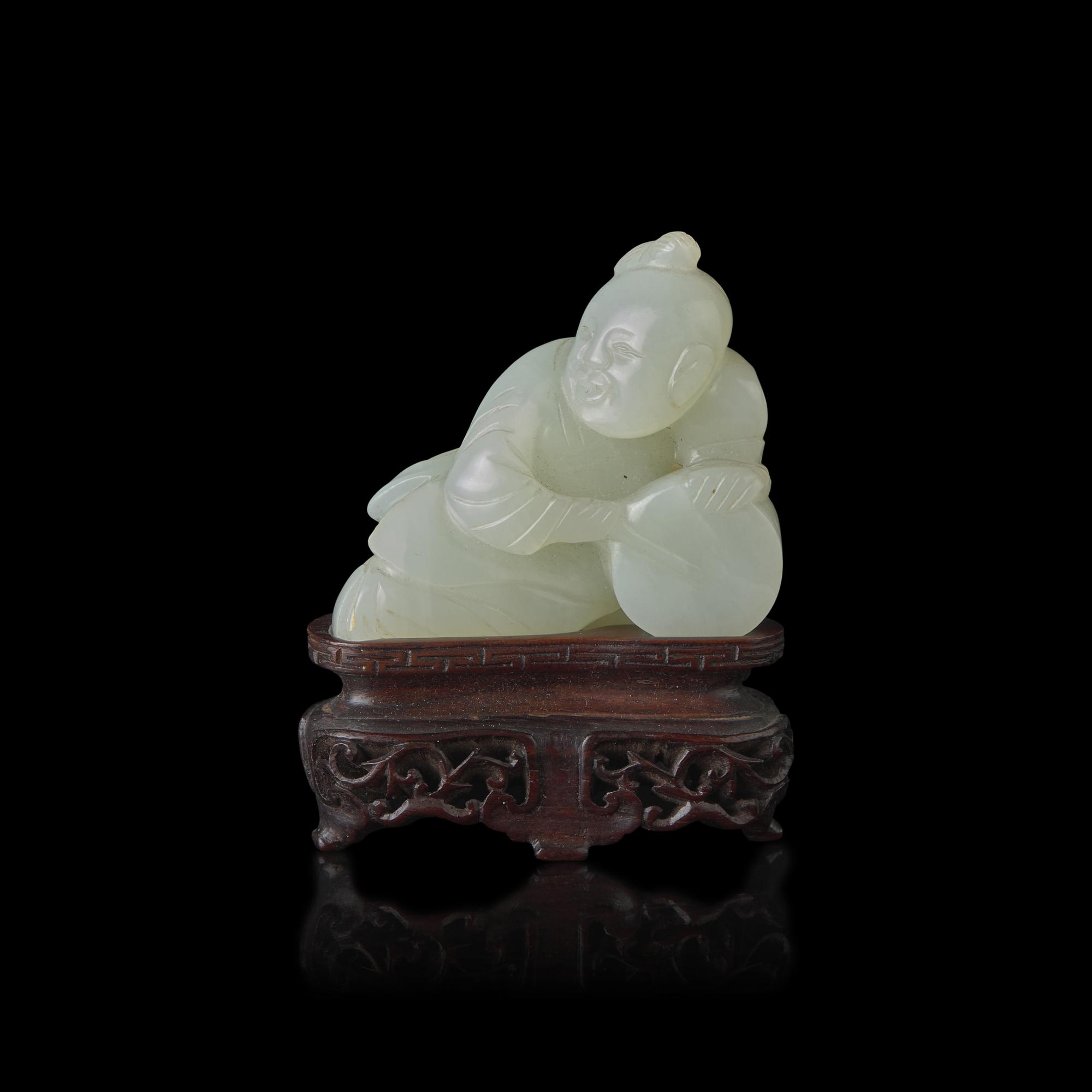 A Chinese White Jade Carved Boy, Qing Dynasty 清 白玉雕弄鼓童子