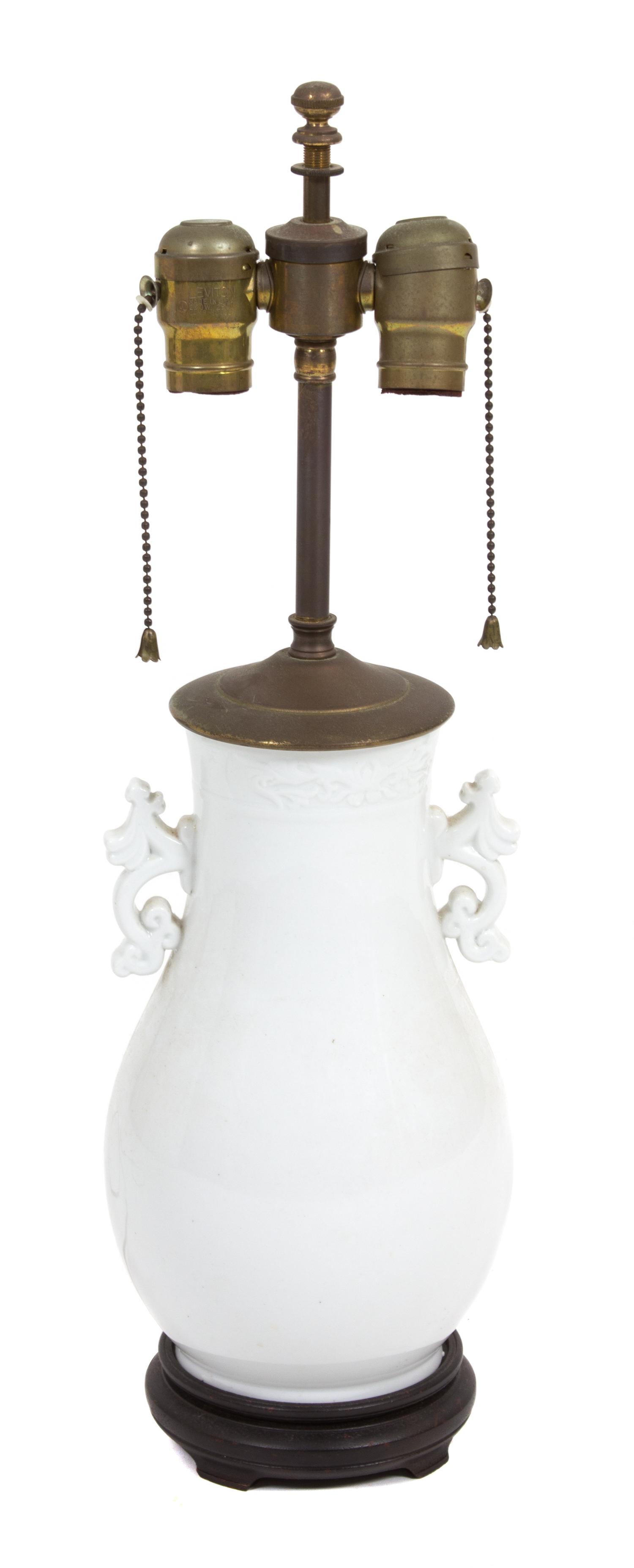 Two White Lamps Height of taller 21 inches to finial. — 20TH CENTURY