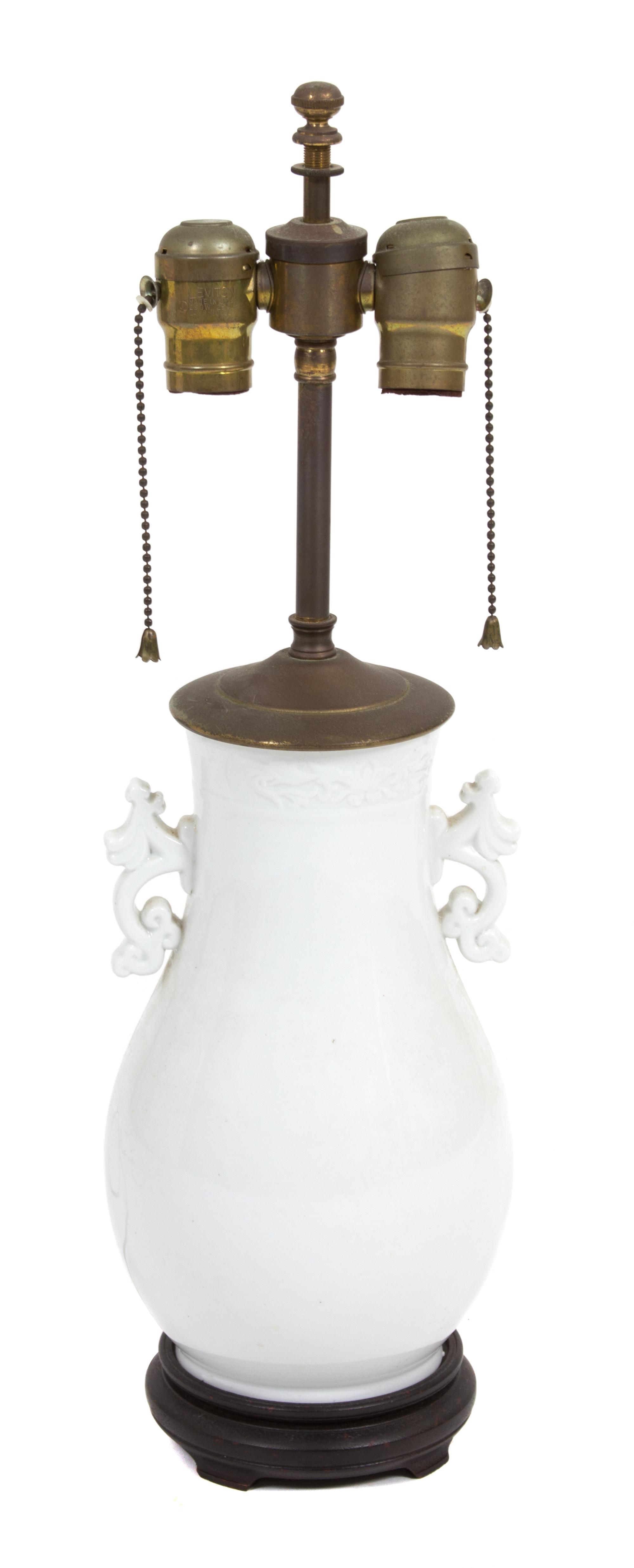 Two White Lamps Height of taller 21 inches to finial. — 20TH CENTURY