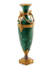 A Louis XVI Style Gilt Metal Mounted Malachite Veneered Urn