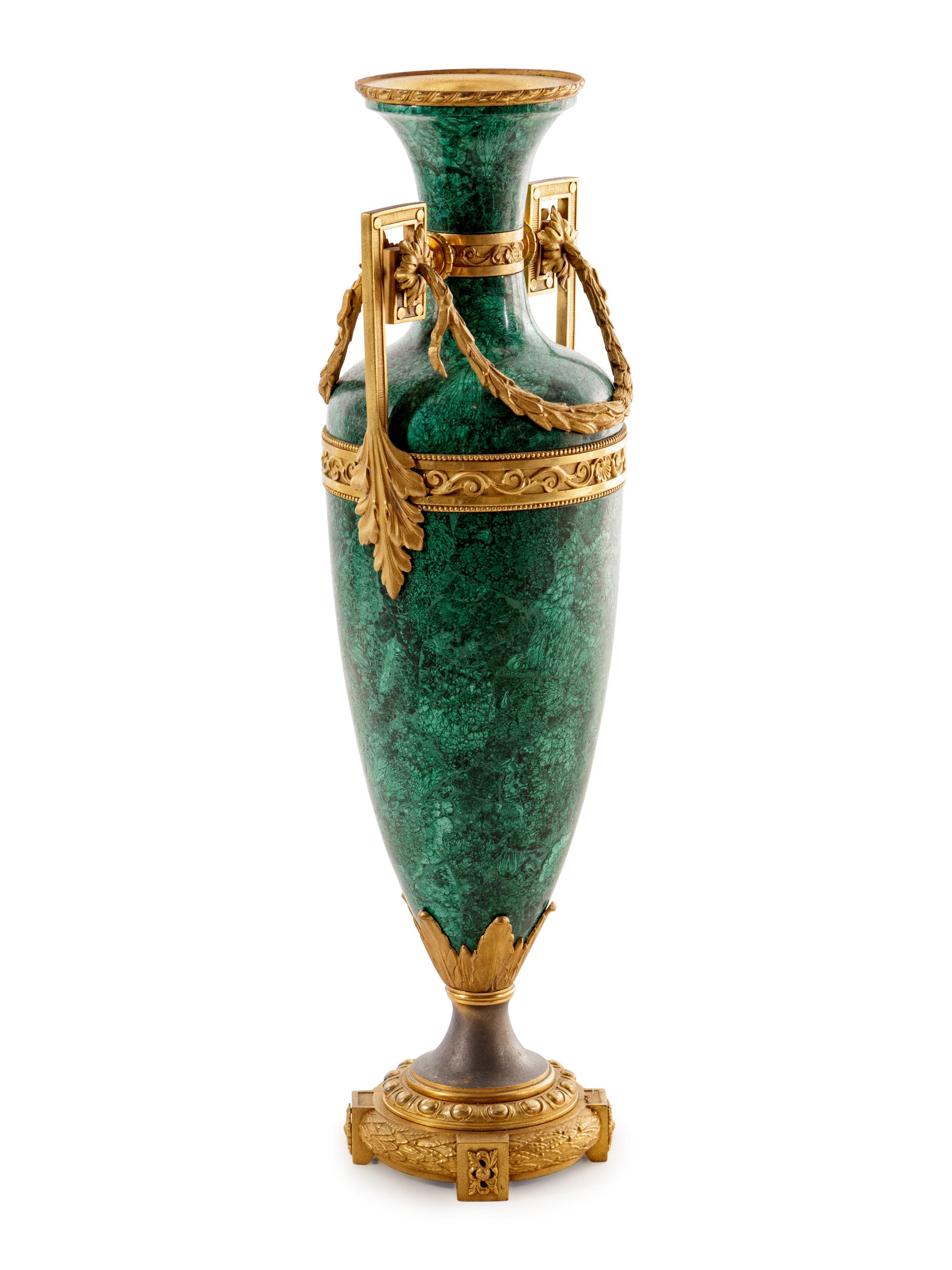 A Louis XVI Style Gilt Metal Mounted Malachite Veneered Urn
