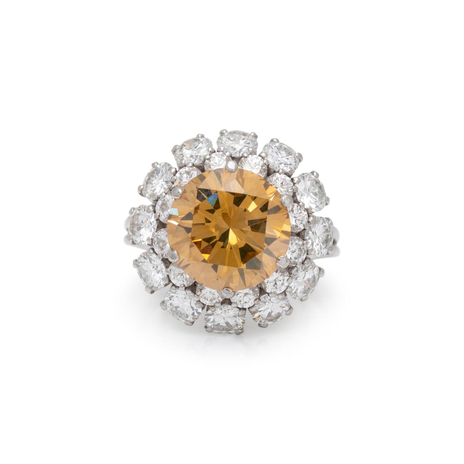 FANCY DEEP BROWNISH ORANGY YELLOW DIAMOND AND DIAMOND RING