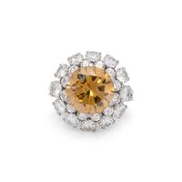 FANCY DEEP BROWNISH ORANGY YELLOW DIAMOND AND DIAMOND RING