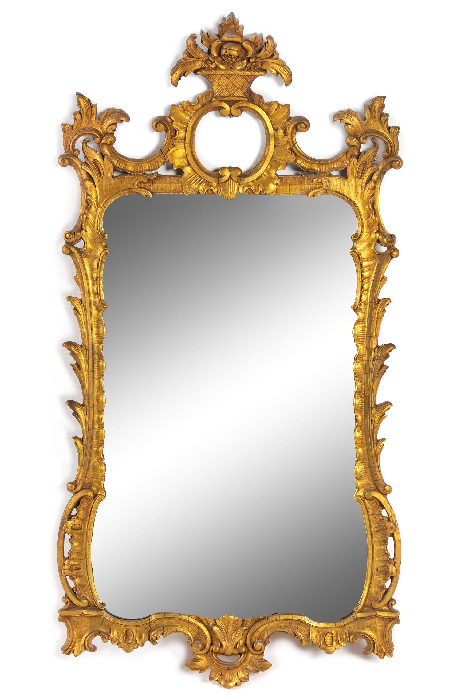 An Italian Baroque Style Giltwood Mirror