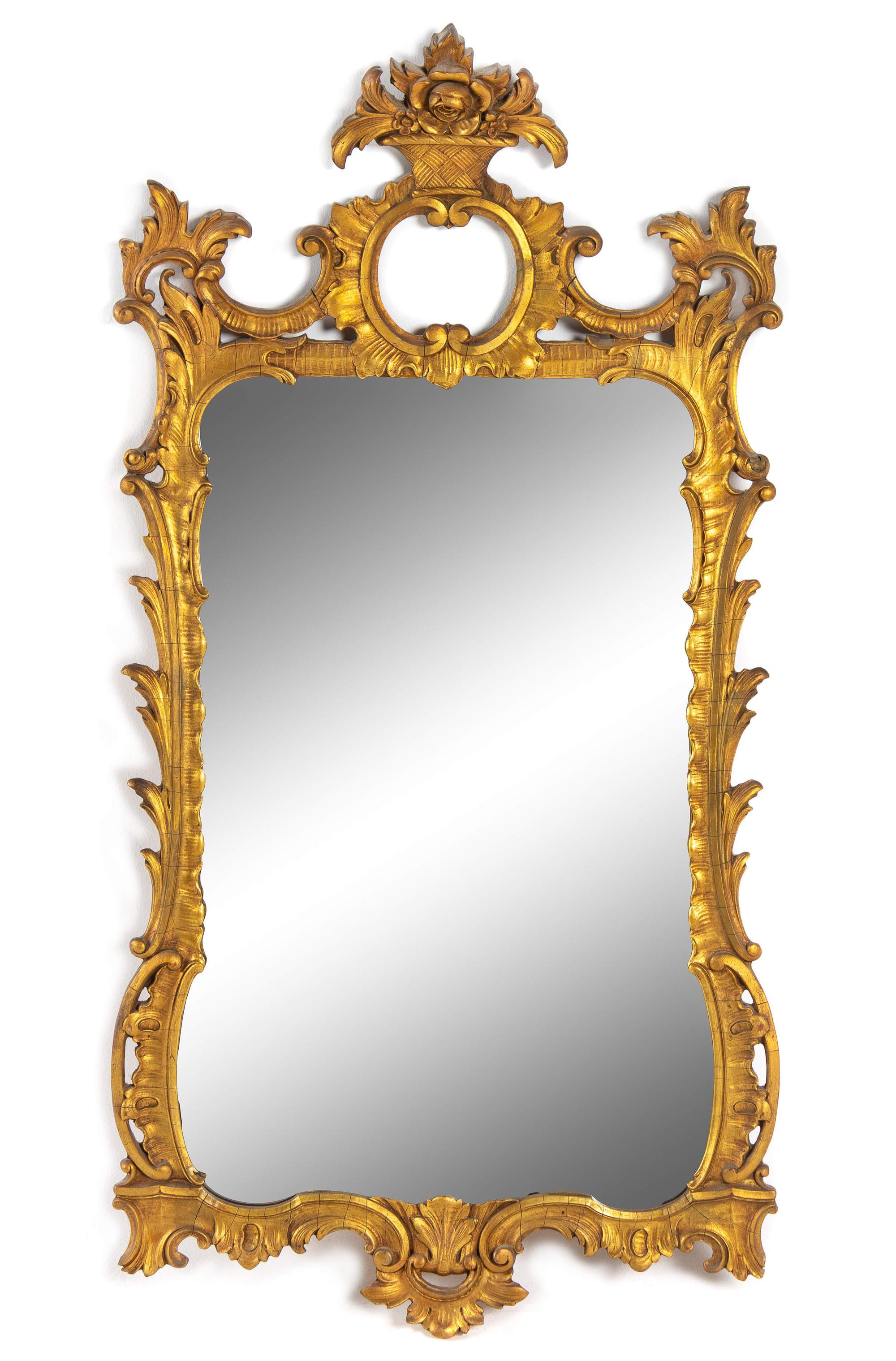 An Italian Baroque Style Giltwood Mirror