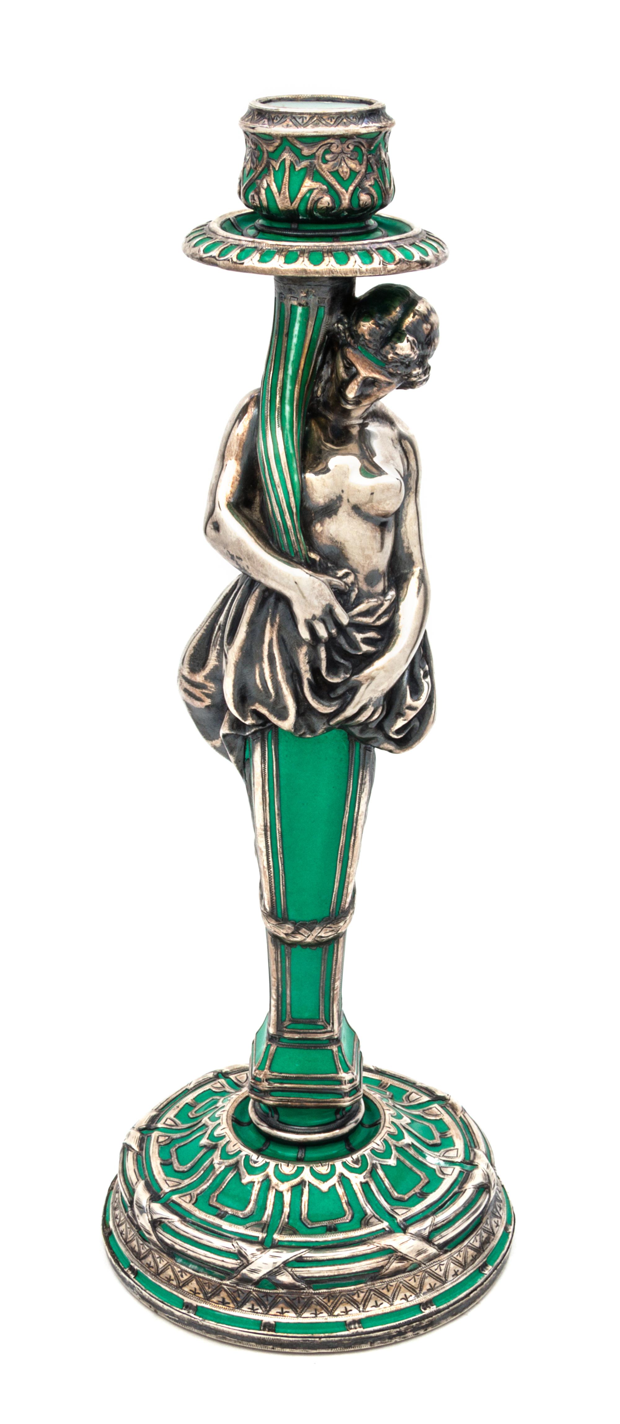 An Art Nouveau Silver Overlay Figural Candlestick Height 13 1/4 inches.