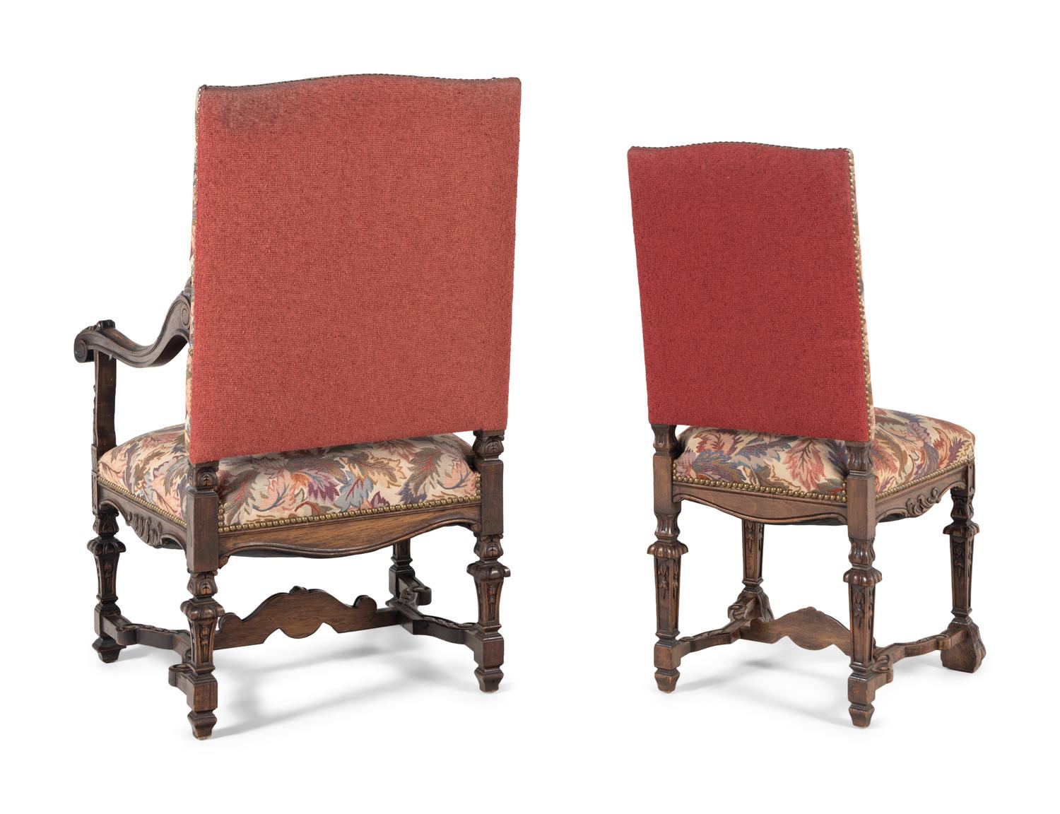 A Set of Eight Renaissance Style Carved Walnut Dining Chairs