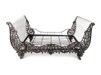 A Continental Cast Iron Sleigh Daybed — 20TH CENTURY