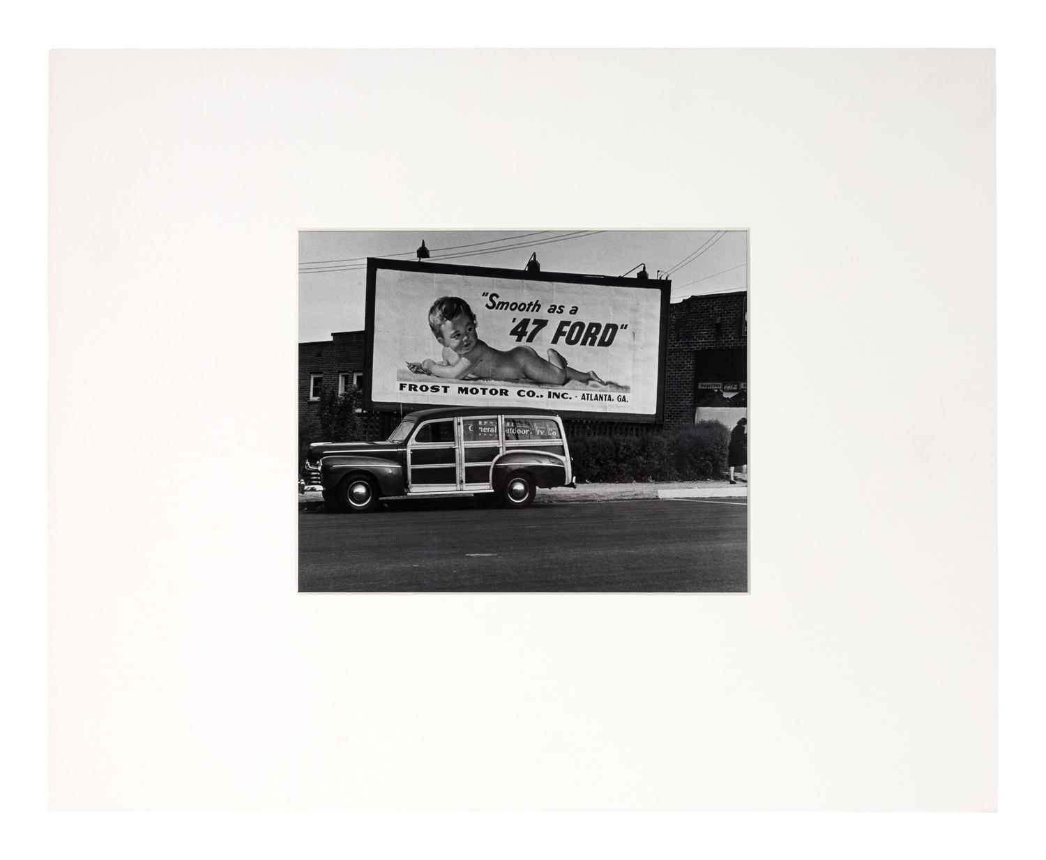 Philippe Halsman (1906-1997) Untitled ("Smooth as a 47 Ford" Billboard), c. 1947