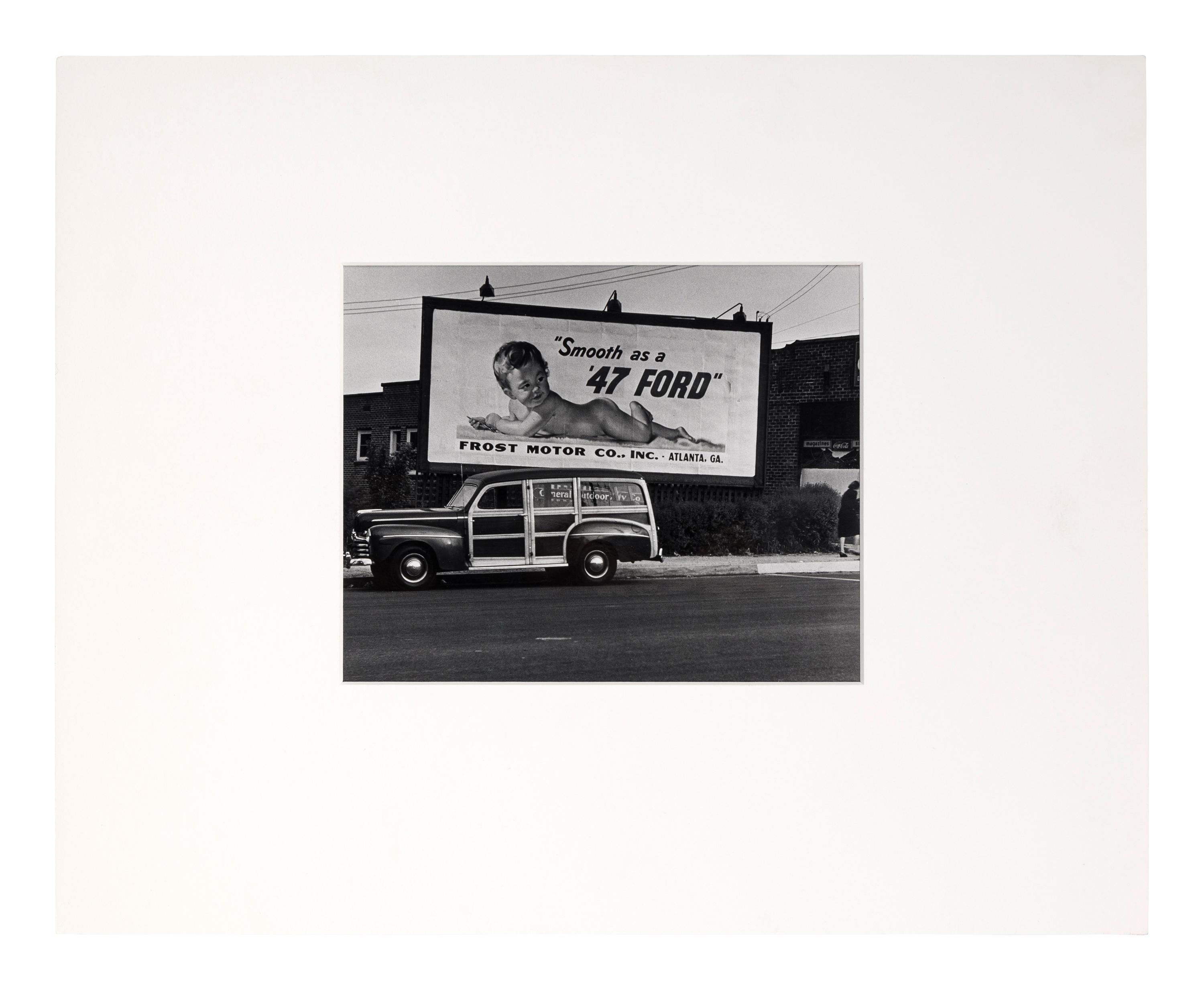 Philippe Halsman (1906-1997) Untitled ("Smooth as a 47 Ford" Billboard), c. 1947
