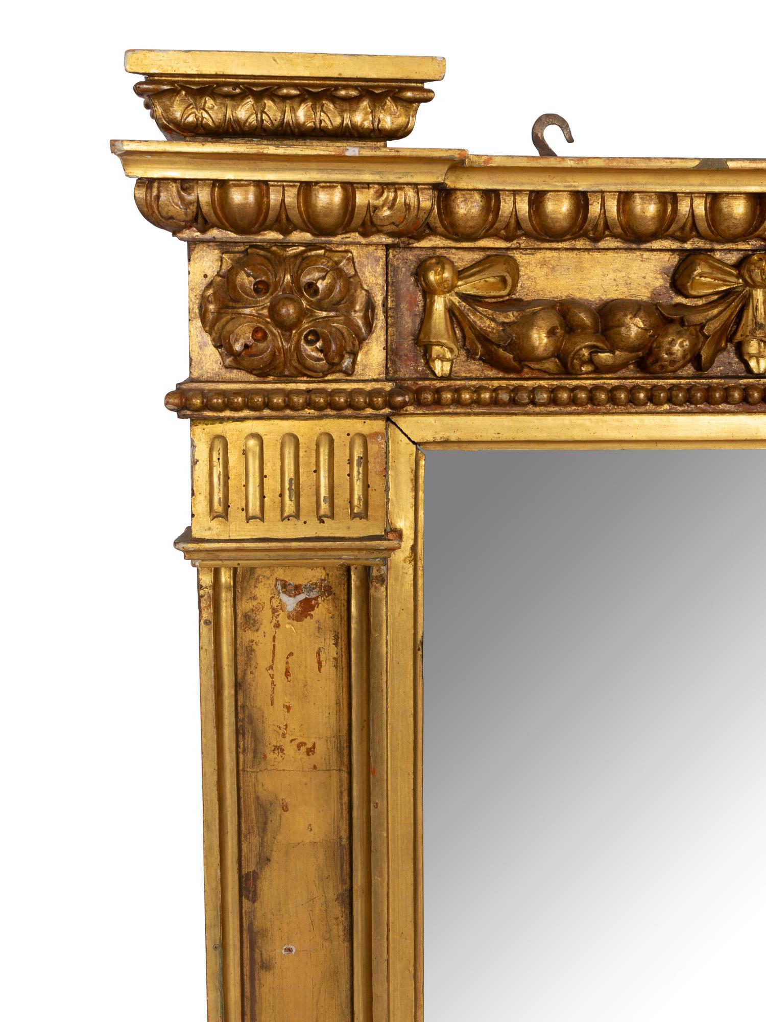 An English Giltwood and Gesso Overmantel Mirror