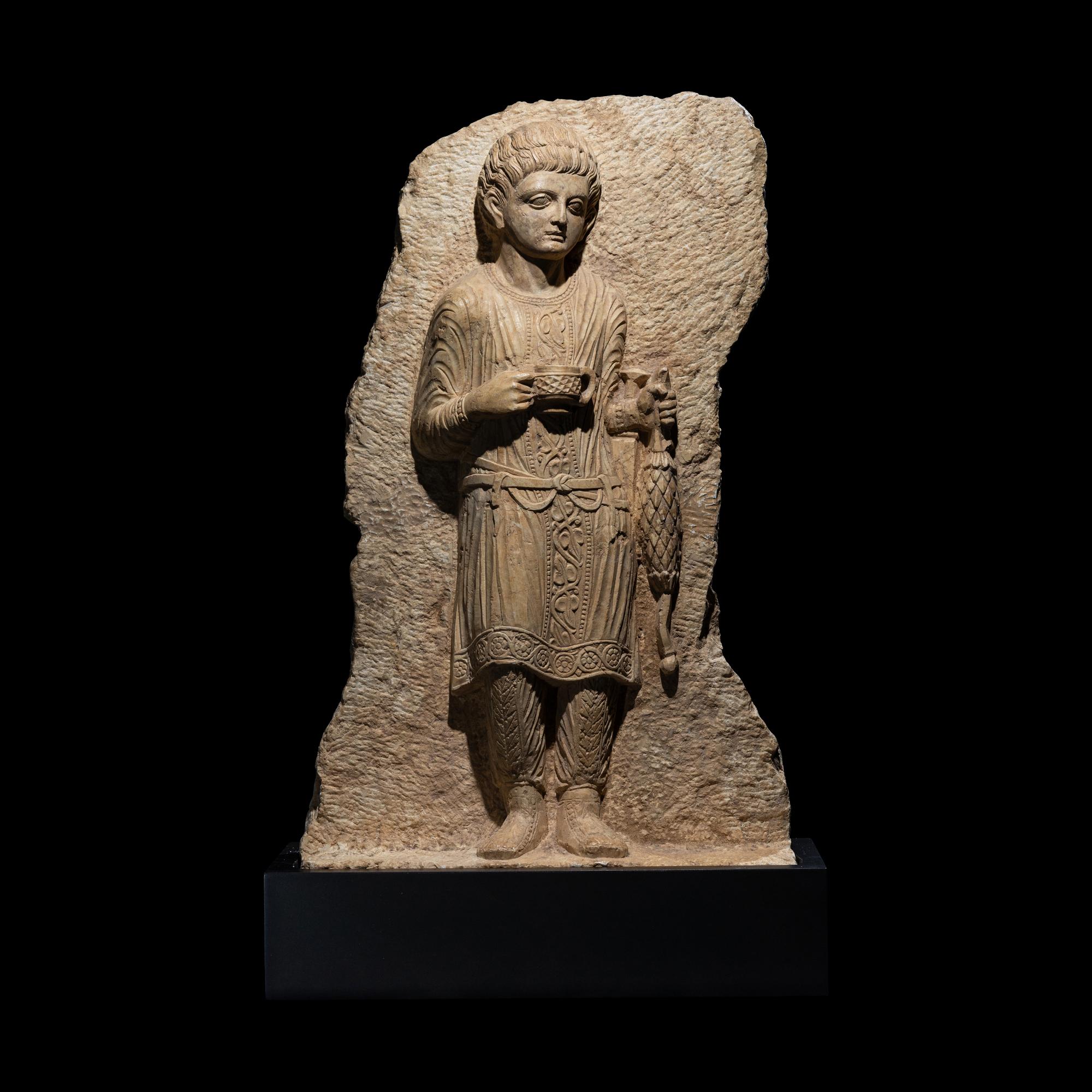 A Palmyrene Limestone Relief Fragment of a Youth