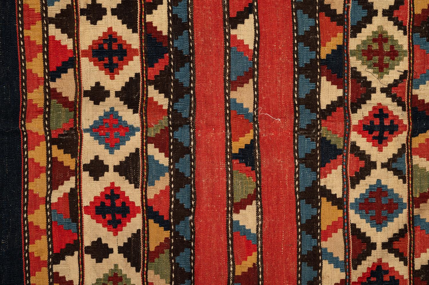 A Group of Three Kilim Rugs