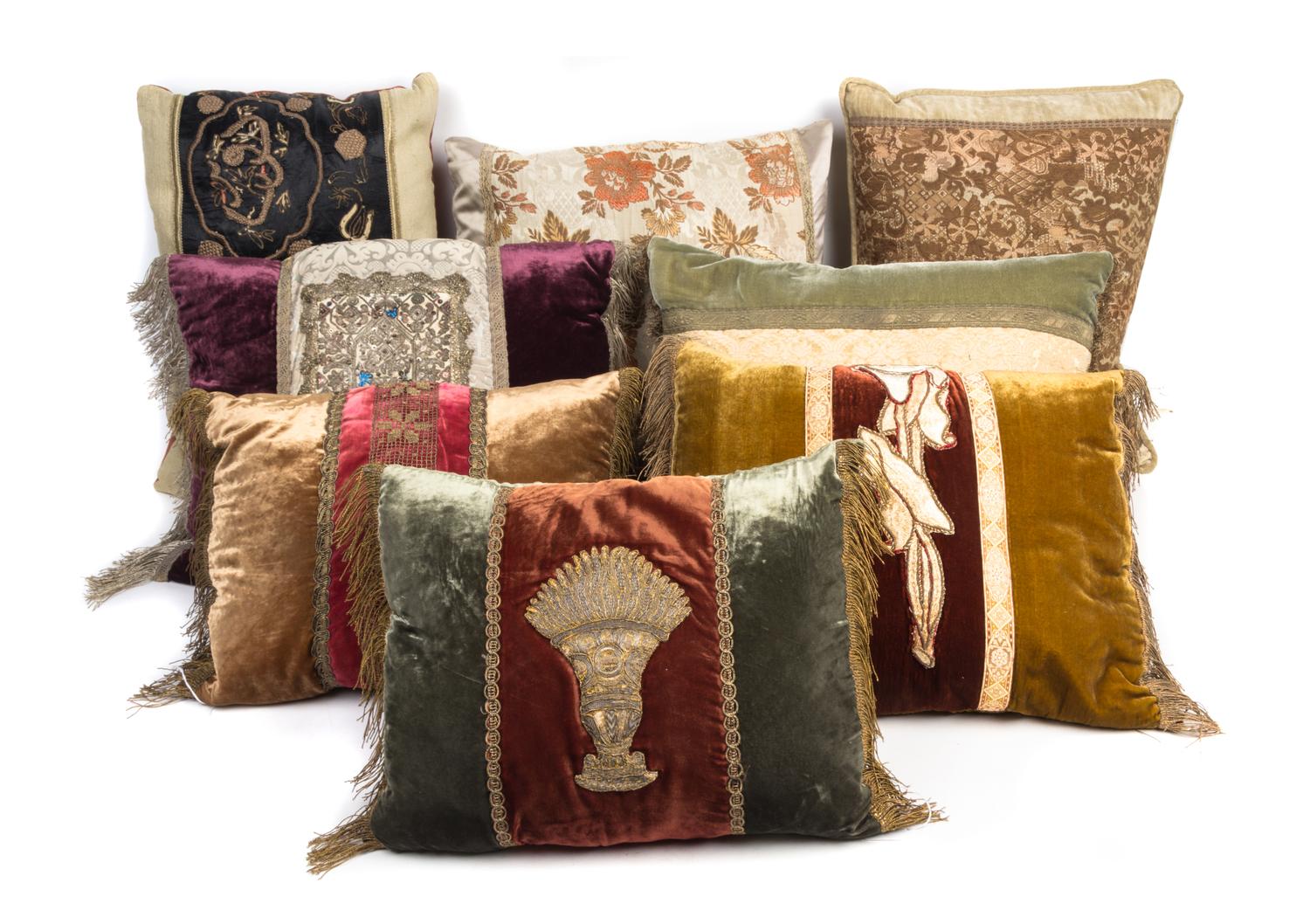A Group of Eight Pillows Largest pillow 17 1/2 inches x 18 inches.