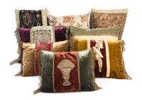 A Group of Eight Pillows Largest pillow 17 1/2 inches x 18 inches.