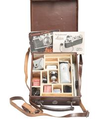 [CAMERAS]. Leica III 35mm camera with accessories and contemporary literature.