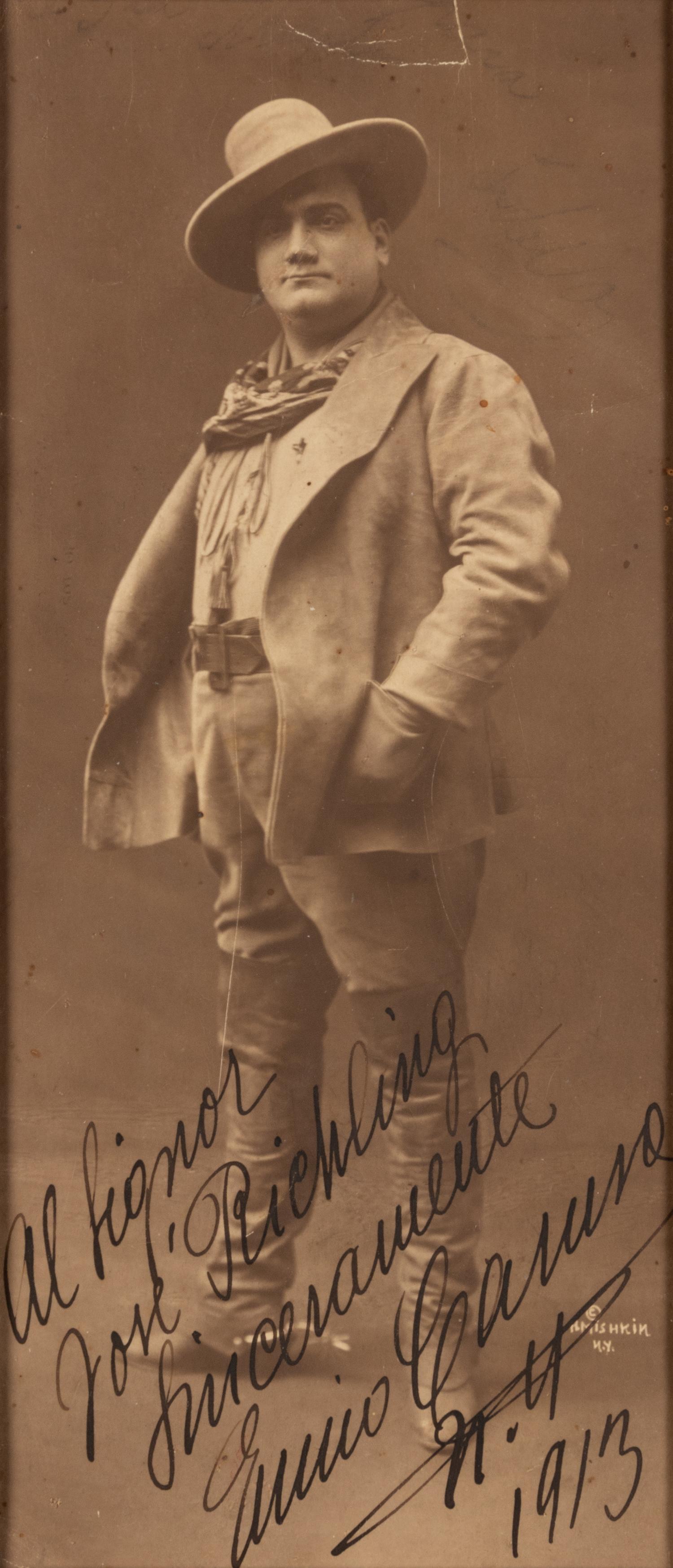CARUSO, Enrico (1873-1921). Sepia photograph as Dick Johnson signed ("Enrico Caruso"), by R. Mishkin, to José Richling. New York, 1913.