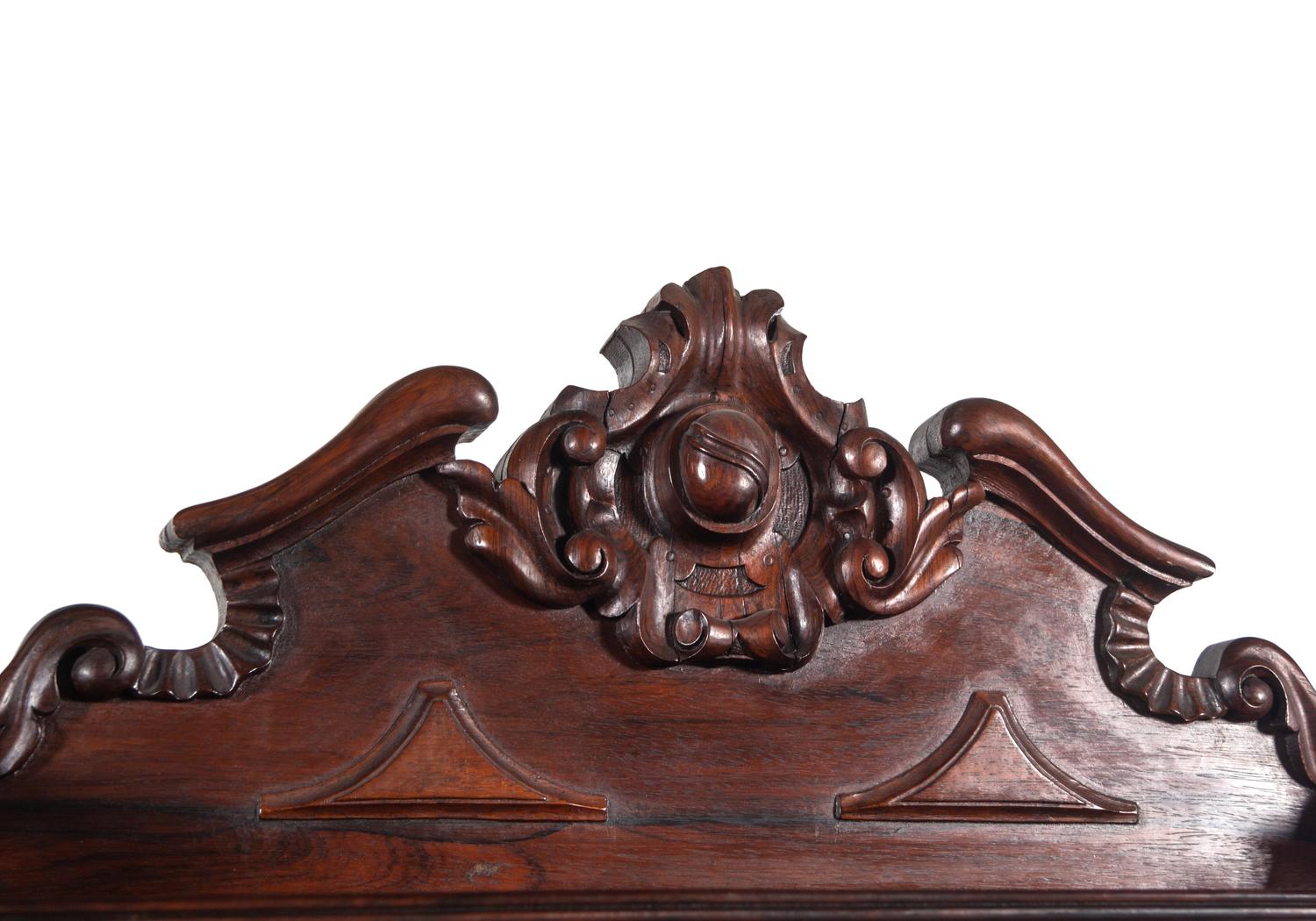 A Rococo Revival Carved Rosewood Marble-Top Serving Cabinet