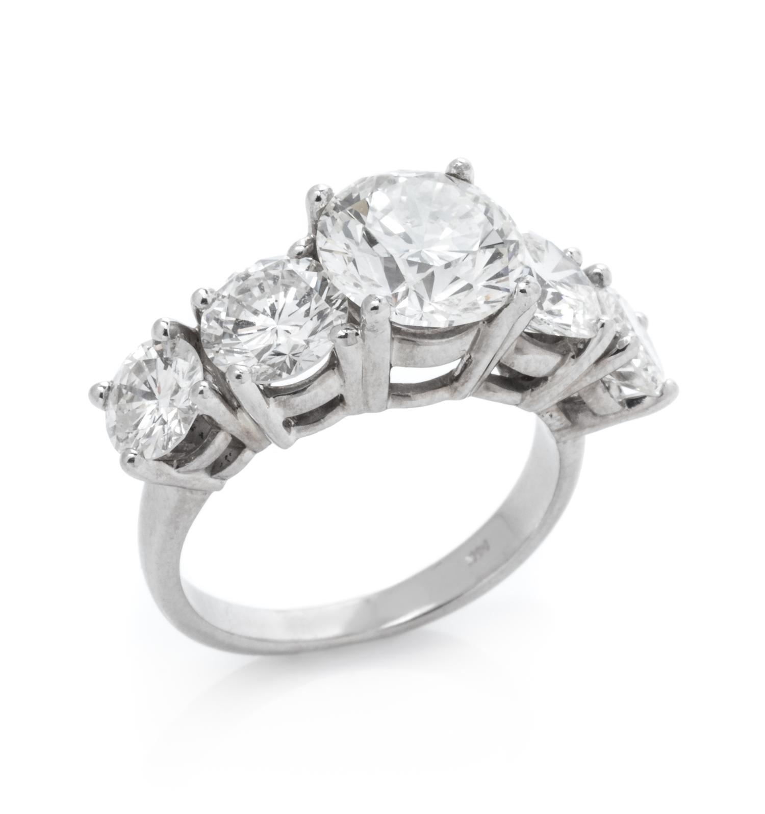 A 14 Karat White Gold and Diamond Ring,