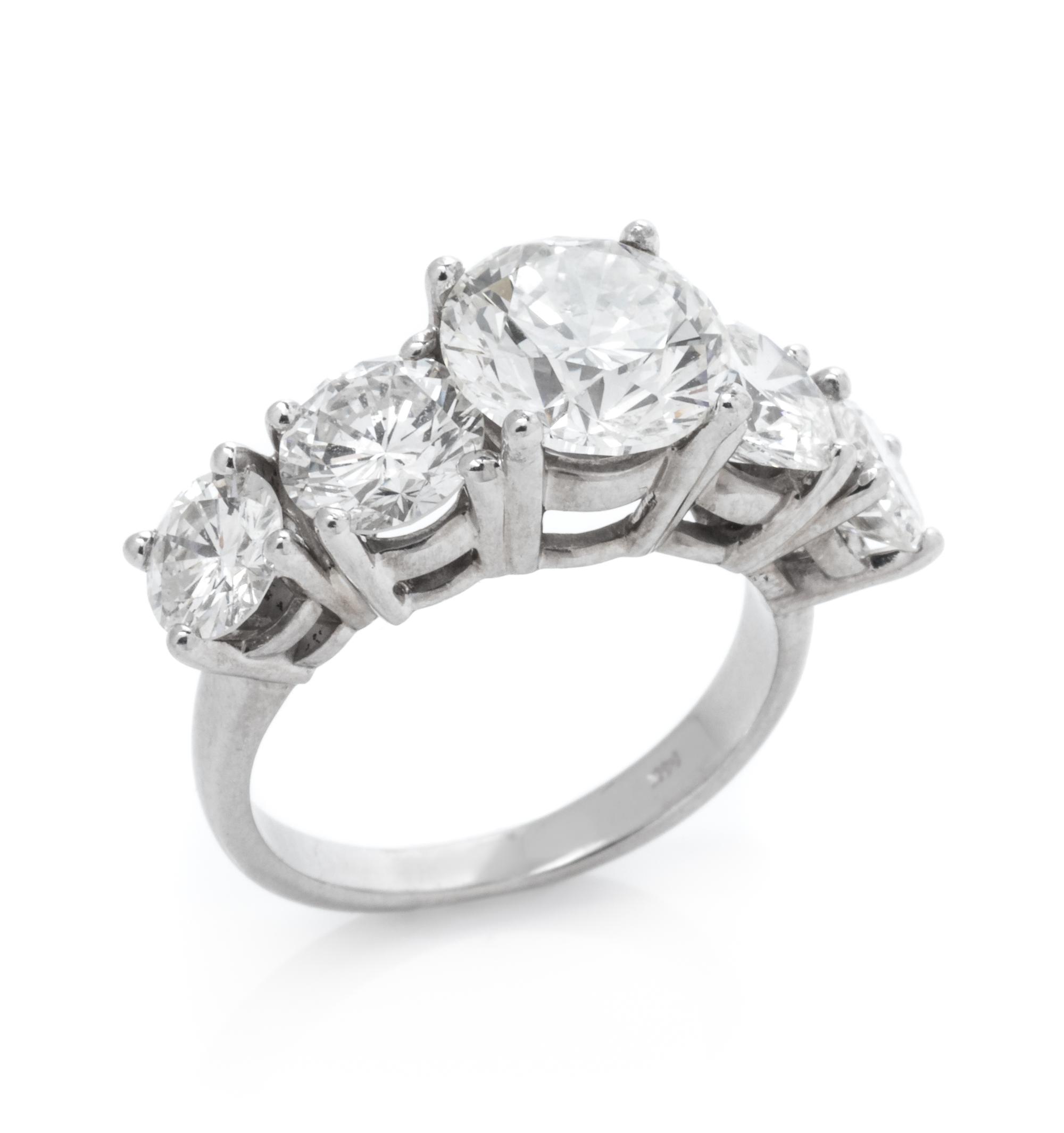 A 14 Karat White Gold and Diamond Ring,