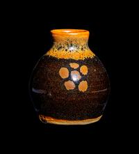 A Small Dark Brown Glazed Stoneware Jar