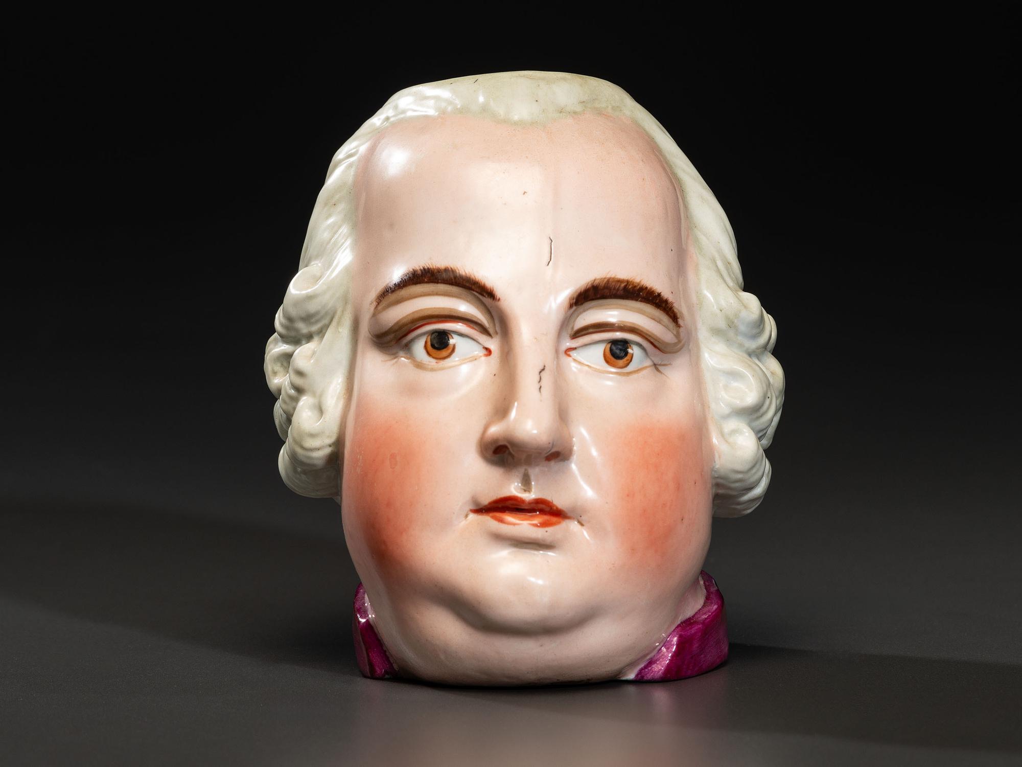 A Staffordshire Enameled Pearlware 'King George III' Figural Shaving Mug