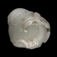 A Carved White Jade 'Peaches and Bat' Group
