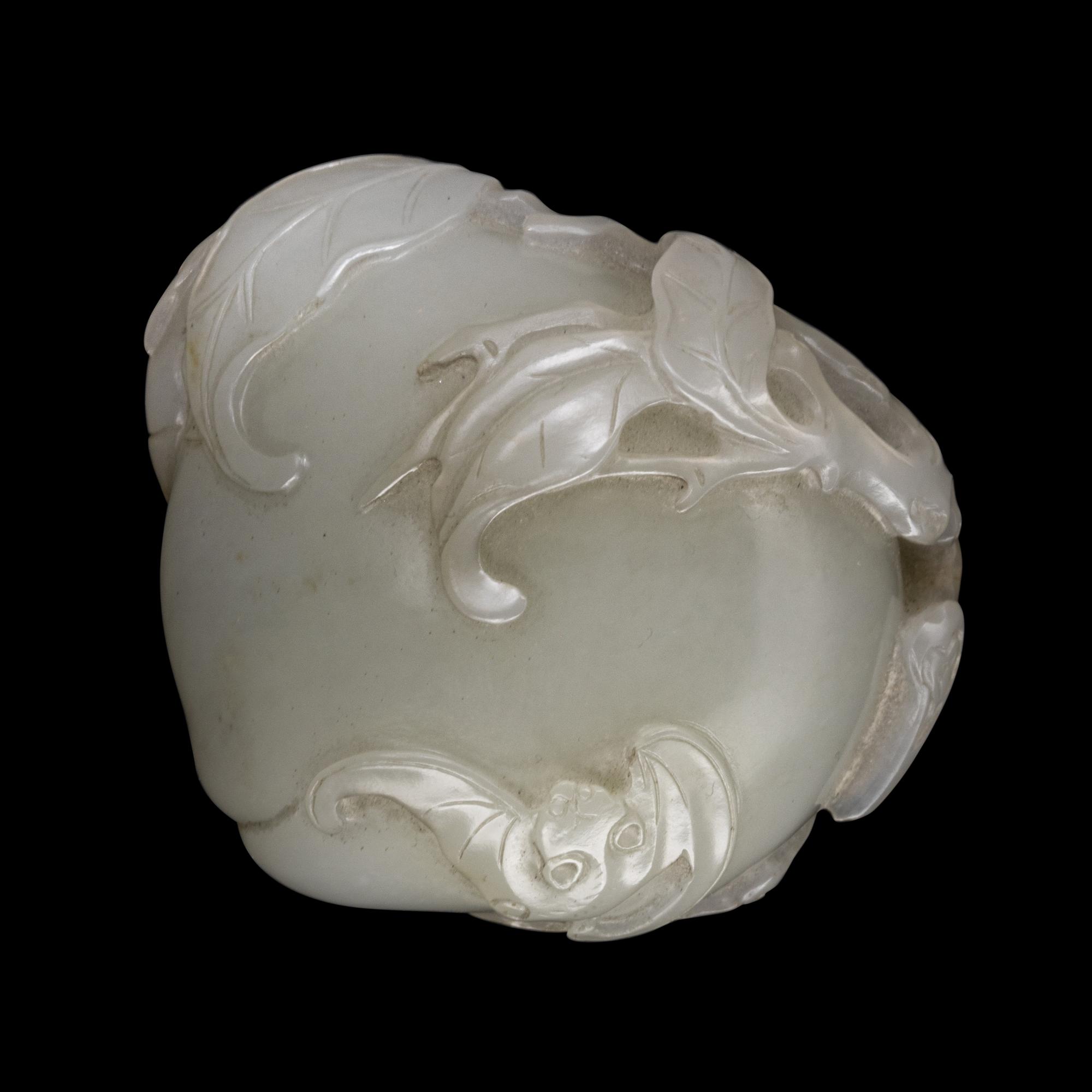 A Carved White Jade 'Peaches and Bat' Group
