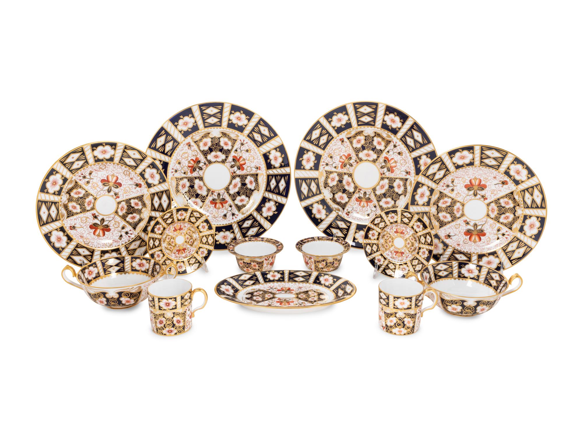A Royal Crown Derby Traditional Imari Porcelain Dinner Service