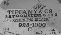 An American Silver Vase, Tiffany & Co., New York, NY, the out-turned undulating rim pierced to show circles and quatrefoils, the body a