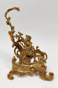 A Pair of Louis XV Style Gilt Bronze Chenets and a Similar Fire Screen