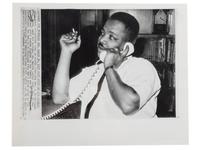 [CIVIL RIGHTS]. A group of 2 press photographs of Reverend A.D. Williams King, brother to Martin Luther King, Jr., comprising: