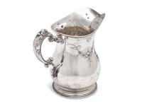An American Sterling Silver Repousse Water Pitcher